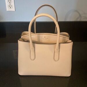 I’ve/cream Kate Spade bag. Used once.
